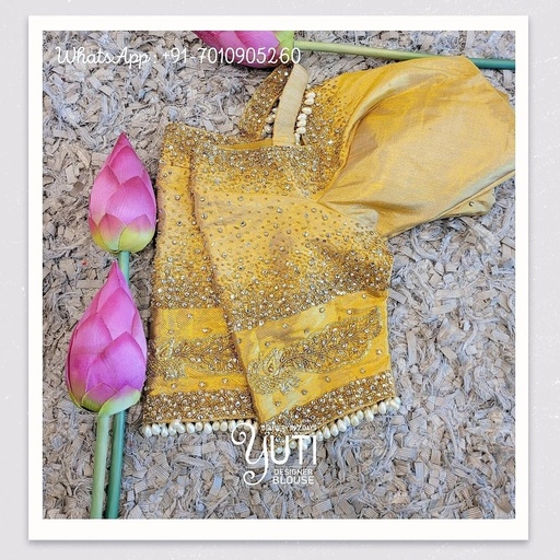 Yellow star dust and peacock design  Stitching